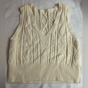 tan sweater vest